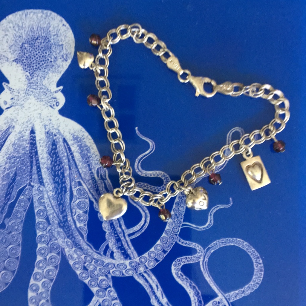 Silver Heart Charm Bracelet 50$